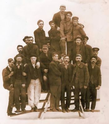 Employees of the Goshen Churn and Ladder Company, Goshen, Indiana

This was Photo was Shared by Beckie Stump Pressler.

This is "Employees of the Goshen Churn and Ladder Company, Goshen, Indiana (circa 1907-1918). 2nd row from front-2nd man from left-Frank Horn(dark hair, beard & mustache), man beside him on right Marshall "Mox" Horn( hat and graying hair). 2nd row 2nd man from right with hat George Horn (no mustache) and man beside him on end with hat Oliver "Ollie" Horn.
