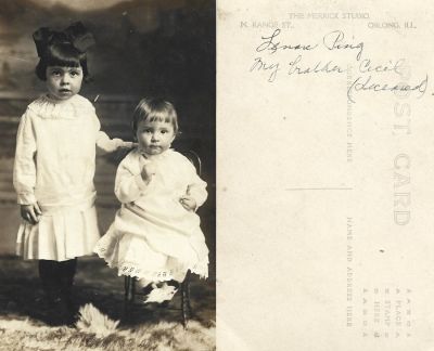 Leah Lenore & Cecil Snearly

This Real Photo Postcard (RPPC) was Donated by D. Robinson.

This Real Photo Postcard (RPPC) States: "Lenore Ping & my Brother Cecil (Deceased)

The Photographers name is "The Merrick Studio", N. Range Street, Chicago, Illinois.

