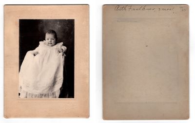 Ruth Faulkner

This photo mounted on board states: "Ruth Faulkner, 3 mos."

The Photographers name is "Miss Bush", Aurora, Indiana
