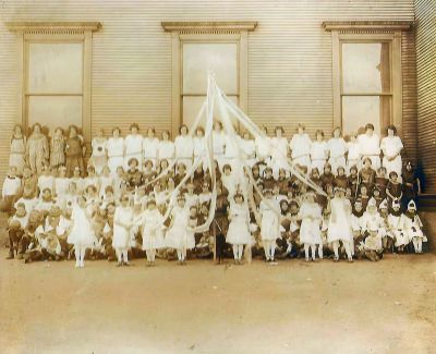 Unidentified

This was Donated by Judy Smith Cooper

Looks to be a May Day Event. The photo mounted on board is unidentified.

NOTE: The original is blurry
