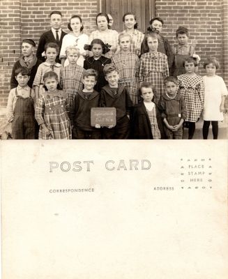 Unidentified

This was Donated by Denise Ayers

Unidentified Real Photo Postcard (RPPC)

The sign states: "Taylor's Corner, District No. 4"

(The children are unidentified)
