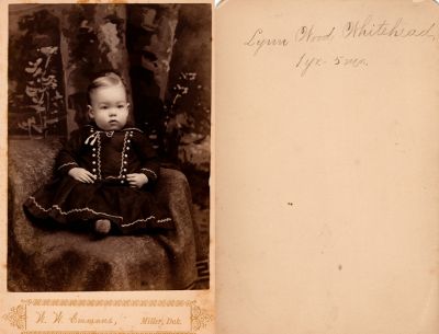 Lindsey Wood Whitehead

This Cabinet Card Photo States: "Lynn Wood Whitehead, 1 year, 5 months"

The Photographers name is "W. W. Emmons", Miller, Dakota Territory.
