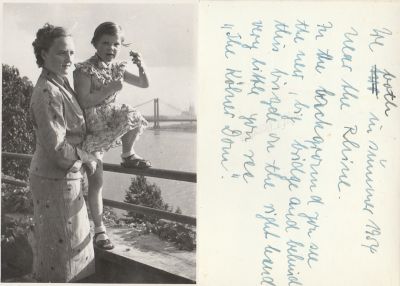 Unidentified

THIS HAS BEEN RETURNED TO FAMILY

This Photo States: "We both in Summer? 1954 near the Rhine. In the background you see the new, big bridge and behind this bridge on the right bend very little you see the Kölner Dom."
